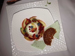 Almond Tofu with nectarine and red berries macerated in peach schapps basil honeycombe and praline